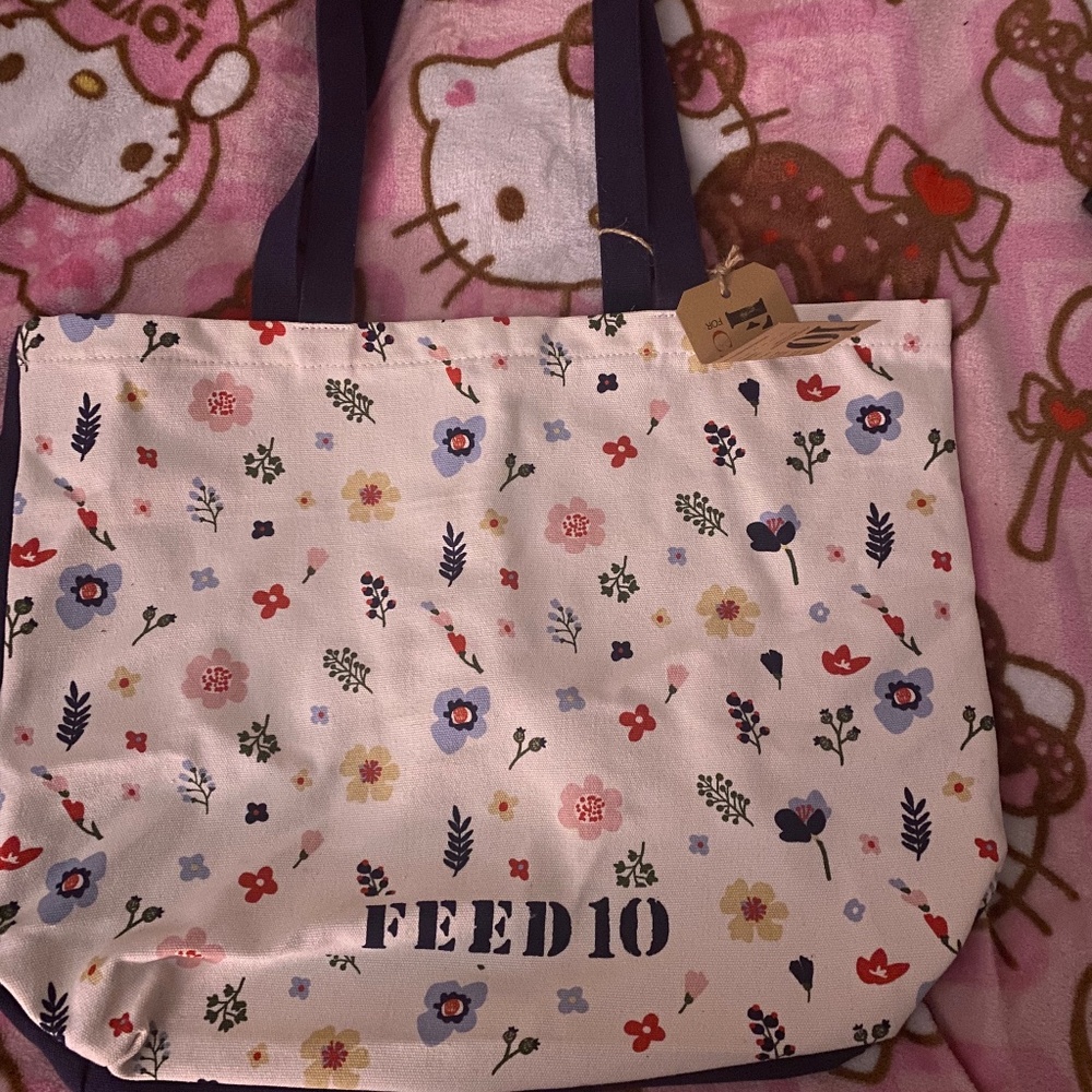 CLARINS FEED 10 TOTE BAG